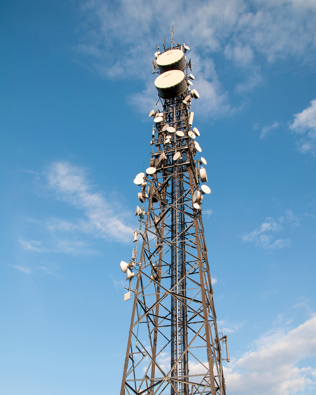 tower with telecom dishes